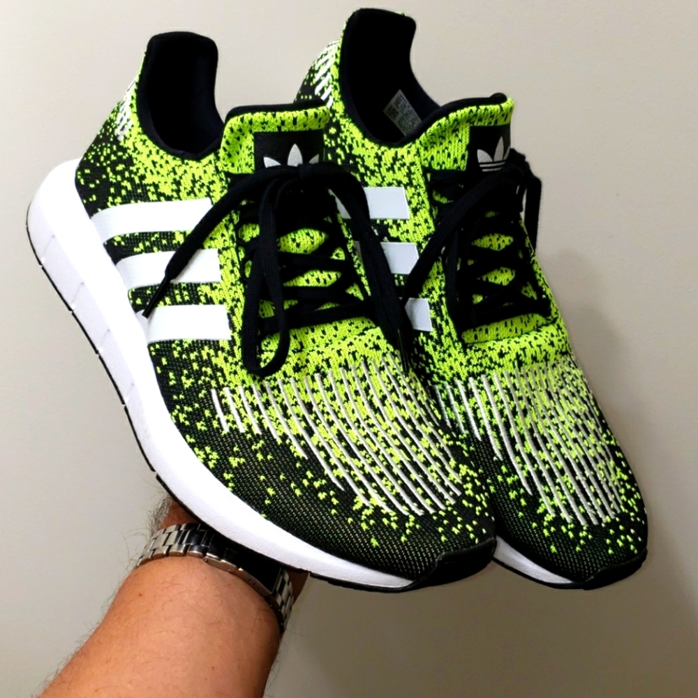 Mens size 12D Adidas Swift Run shoes.